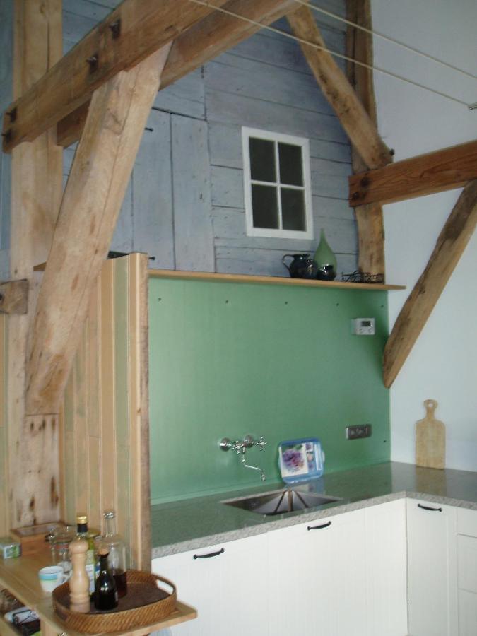 Koetshuis *